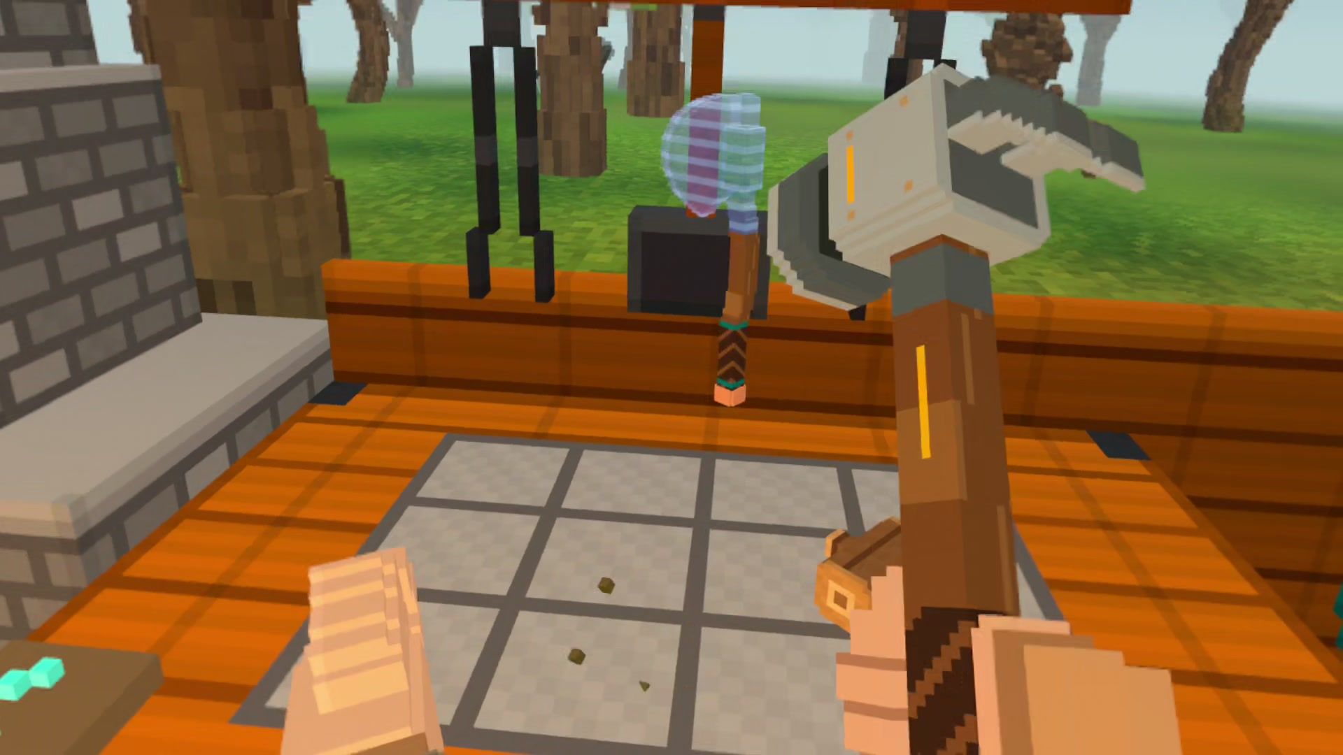 A hammer raised over an anvil, with the outline of an axe waiting to be forged